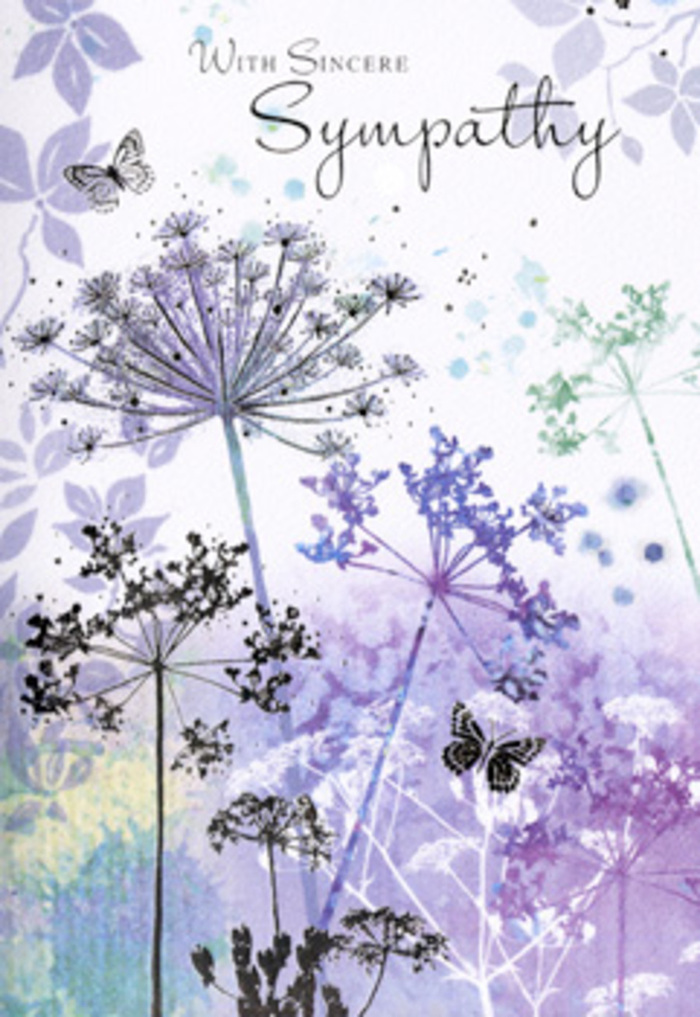 There is a serene, contemplative beauty at the heart of this sympathy card's design, reminiscent of pausing for a reflective moment along the quieter streets of Harold Wood. Tall wildflowers with spindly, graceful stems rise from the bottom edge of the card, curving gently as they reach upward. At their tips, intricately detailed umbel-shaped blooms unfurl like tiny fireworks frozen in soft focus. Each head is composed of slender lines and minuscule florets, their filigree forms painted in a soothing palette of violet, soft lilac, powdered blue, and hints of silvery grey. The background surrounds them in hazy watercolour layers-tones of lavender, cool blue, and misty green overlapping, blending, and dissolving into one another. This blurred effect suggests the kind of dewy, early morning light you might catch across local gardens or woodland paths. Two butterflies hover just above the flowers, their wings semi-transparent, barely edged with colour, suggesting both fragility and hope. The lighting appears diffuse, bathing the entire scene in a soft, even glow that invites quiet reflection. Nothing in the artwork shouts for attention; instead, the open spaces and gentle contours create an ambience of respect and stillness, much like the calm atmosphere of a funeral service or memorial gathering. For someone seeking to express support to a family in Harold Wood, this card offers more than written condolences. It feels like an invitation to pause and breathe, to remember a loved one with tenderness. The design reflects the sensitivity and care that a local florist brings when arranging sympathy flowers, ensuring every detail supports, rather than overwhelms, those enduring loss.