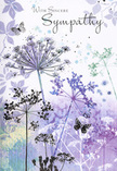 This sympathy card reads like a soft-spoken poem in visual form, its gentle colours and airy lines echoing the calm of Harold Wood's residential streets at twilight. Across the front, silhouettes of wildflowers stretch upwards in a loose, natural rhythm. Their stems are fine and flexible, painted in muted green-grey tones that vanish gracefully into the background. The umbelliferous flower heads at the top of each stem are drawn with intricate delicacy, each tiny floret fanning out to create a lace-like canopy in shades of lavender, indigo, and pale blue. The impression is of a quiet meadow at dusk, its details softened by fading light. Around and behind the flowers, pale petals and faint foliage shapes drift in and out of view, rendered in translucent washes that blend lilac, dove-grey, and cool blue into a dreamlike haze. Here and there, butterflies hover among the blooms, their wings barely outlined, as if they have just alighted and might lift away at any second. They evoke a sense of transformation, continuity, and the gentle presence of memories that linger. The overall palette is cool yet warm in feeling, calming rather than cold, with seamless gradients that soothe the eye. Against this serene backdrop, the words With Sincere Sympathy appear in a refined, flowing script, lending an extra note of kindness and care. The card feels as thoughtfully composed as a condolence arrangement prepared by Flowers Harold Wood-understated, respectful, and wrapped in nature's reassurance-making it a fitting accompaniment to funeral flowers or sympathy deliveries within the Harold Wood community.